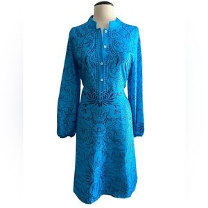 Gorgeous handmade dress. Adorable style and beautiful colors and pattern.